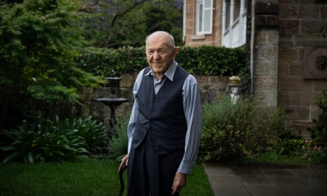 A portrait of Alex Bartos, who is 100 years old, in the garden of his home in Sydney, Australia