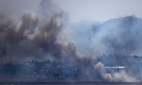 Smoke rises from a fire caused by an Israeli strike on the outskirts of Khiam, southern Lebanon, on Friday
