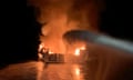 Flames engulf boat in water