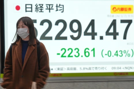 A electronic stock board showing Japan's Nikkei index during today’s trading session