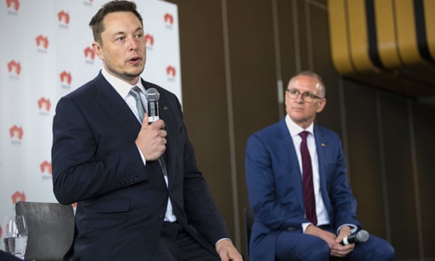 South Australian premier Jay Weatherill listens to Tesla chief executive officer Elon Musk speak during an official ceremony in Adelaide to announce that Tesla will install the world’s largest grid-scale battery in the South Australian state.