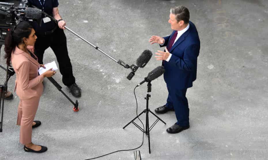 Photograph looking down on Keir Starmer giving a socially distanced broadcast interview