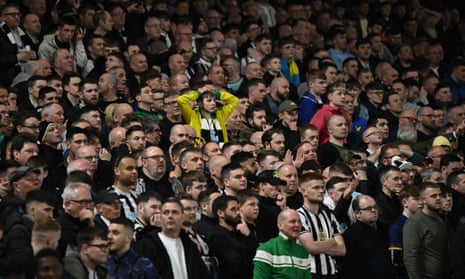 Newastle fans wait for the result of a VAR (Video Assistant Referee) review that disallows their second goal.