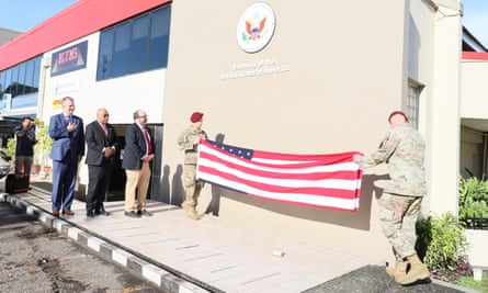 A US flag is unfurled at the embassy opening in Honiara
