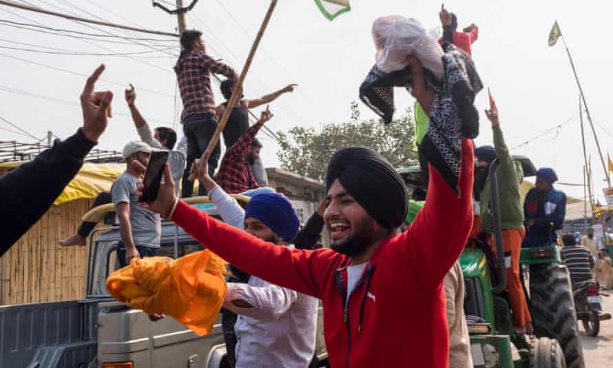 Farmers celebrate in Singhu.