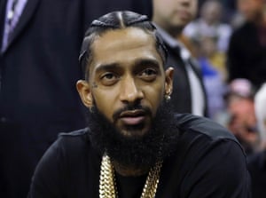 The late rapper Nipsey Hussle, pictured at a 2018 NBA game, won the 2020 Grammy award for best rap performance.