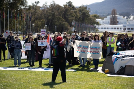 A protest on the front lawns of Parliament House, Canberra against a lecture inside featuring Moira Deeming and Katherine Deves titled “Why can’t women talk about sex?” .