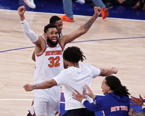 Karl-Anthony Towns of the Knicks celebrates after his team's 107-106 victory against the Spurs in Game 4 of the NBA finals
