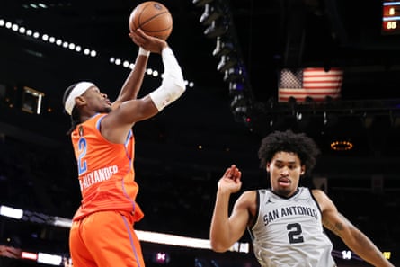 Spurs Thunder BasketballOklahoma City Thunder guard Shai Gilgeous-Alexander (2) goes for a shot over San Antonio Spurs guard Dylan Harper (2) in the first half of an NBA Cup semifinals basketball game, Saturday, Dec. 13, 2025, in Las Vegas.