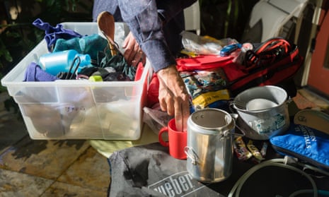 Planetary science professor Roland Burgmann sorts through camping gear at his home in Berkeley, California, on 11 July 2019.