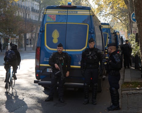 Police forces filter pedestrians entering the Bastille in Paris, France.