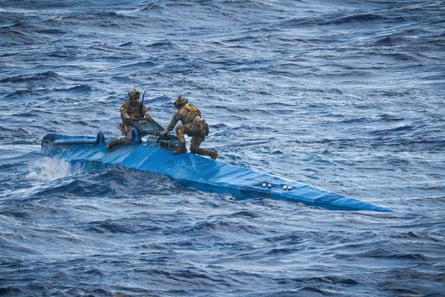 The British Royal Navy intercepts a ‘narco-sub’ off the coast of the Caribbean.