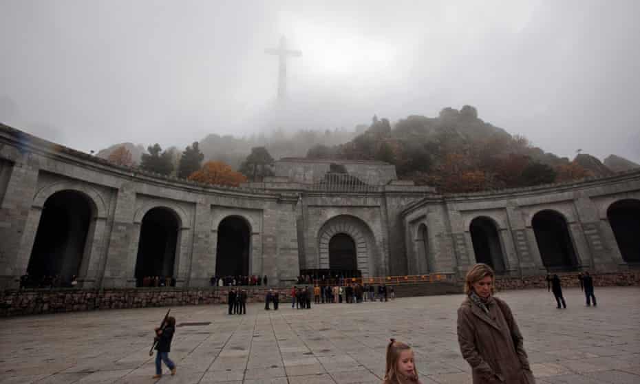 People leave after attending mass at the basilica where the tombs of Spain’s former dictator General Franco and de Rivera lie, near Madrid.