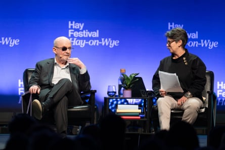 Erica Wagner listens as Salman Rushdie talks on stage at Hay.