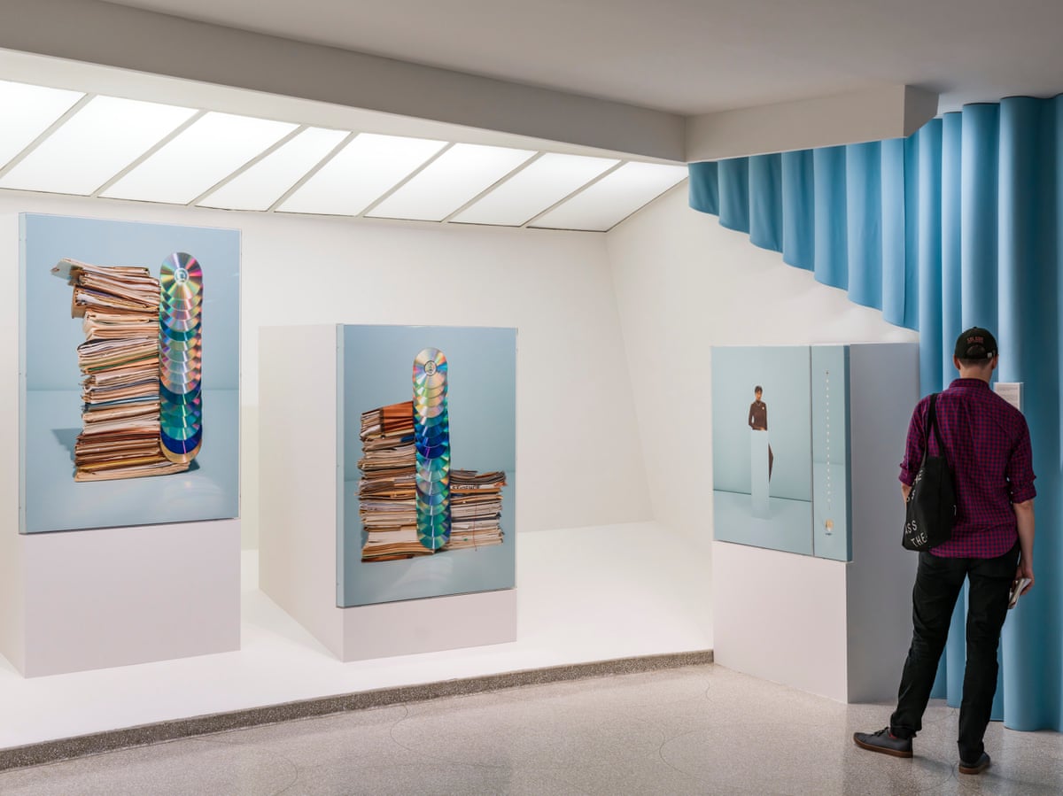 a person standing in a gallery