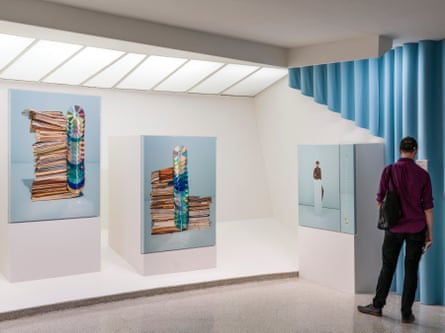 a person standing in a gallery