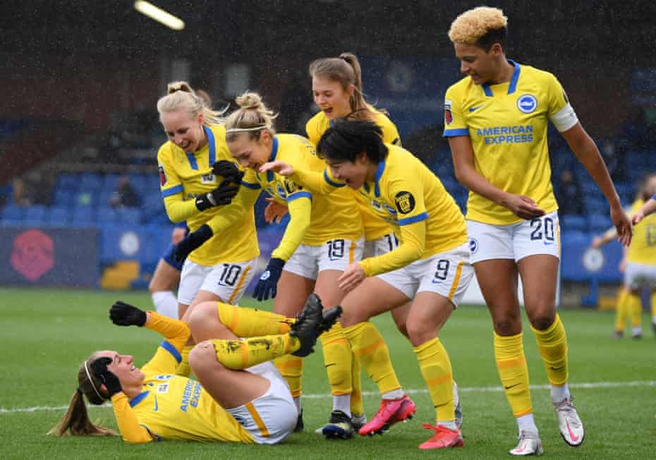 Aileen Whelan (on the ground) celebrates after a goal against Chelsea at Kingsmeadow in February.
