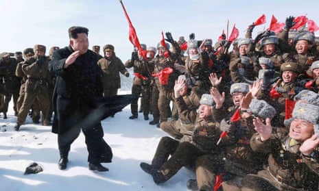 Kim Jong-un waves at pilots of the Korean people’s army.