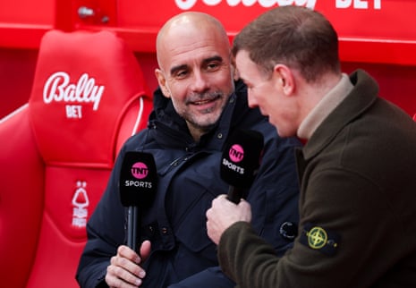 TNT Sports pundit Joe Hart gets the badge in as he interviews his former boss, Pep Guardiola.