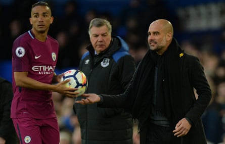 Sam Allardyce in the background as Pep Guardiola talks to Danilo during Everton’s 3-1 home defeat by Manchester City in March 2018.