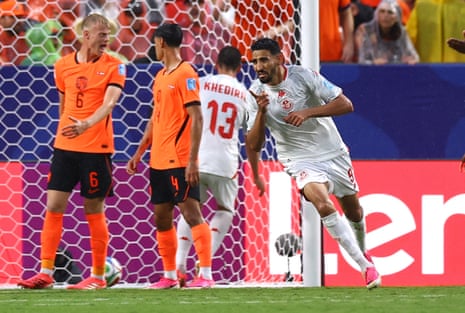 Tunisia's Hazem Mastouri celebrates scoring their first goal