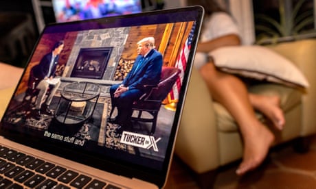 People watch Carlson interview of Trump on the platform 'X'<br>epa10816803 A viewer streams former President and Republican presidential candidate Donald Trump's interview by Tucker Carlson on the platform 'X' on their computer in Miami, Florida, USA, 23 August 2024. Trump chose not to attend the debate and instead do the interview with Carlson. The pre-recorded interview is being aired at the same time as the Republican presidential debate. EPA/CRISTOBAL HERRERA-ULASHKEVICH