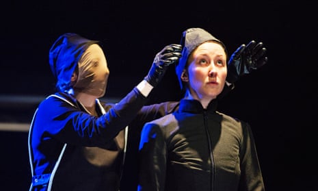 Erin Doherty, pictured with a masked Sophie Melville in The Divide.