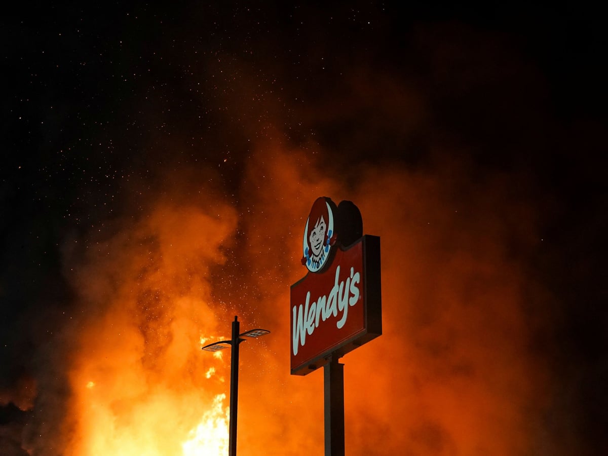 Rayshard Brooks shooting: protesters set fire to Wendy's as police ...