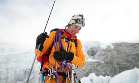 Smiling in mountaineering gear