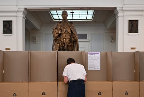 A woman is seen casting her vote during early voting for the Indigenous Voice to Parliament referendum at the Museum of Australian Democracy at Old Parliament House in Canberra, Tuesday, October 3, 2023. (AAP Image/Lukas Coch) NO ARCHIVING