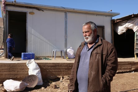 Mahmoud Eshaq and his family prepare to leave their home in Ras Ein al-Auja after continued harassment from Israeli rightwing settlers, 11 January 2026.