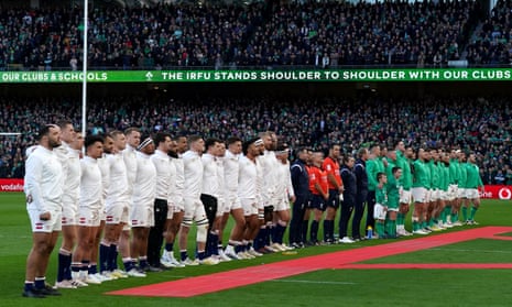 England and Ireland line up for the national anthems.