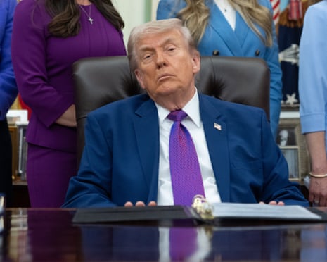 Donald Trump speaks to reporters at an event promoting maternal health care in the Oval Office.