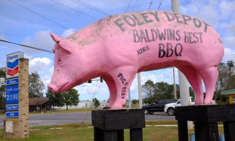 Huge Pink plastic pig in front of the Depot Chevron barbecue gas station in Foley, Alabama