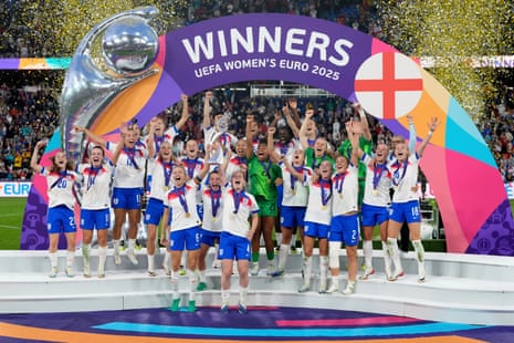 leah williamson and keira walsh lift the trophy