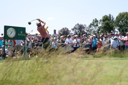 Scottie Scheffler tees off