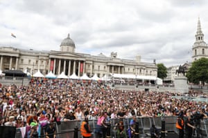 A crowd gathers in front of the stage in Trafalgar Square