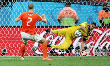 Sergio Romero of Argentina saves Ron Vlaar's penalty to help his team towards the final.