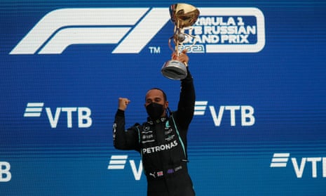 Lewis Hamilton celebrates winning his 100th Formula One victory, in the Russian Grand Prix in Sochi.