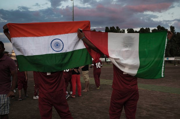 Gurpreet and his friend show both the Italian and Indian flags after winning the first official cricket tournament set up in Pontina by local NGOs