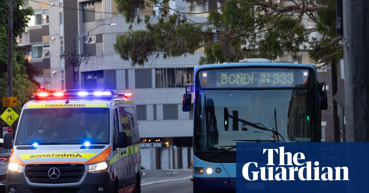 Police advise people to ‘take shelter’ following reports of shooting at Bondi beach with two in custody