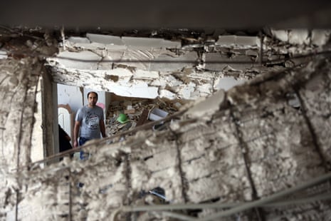 IAn Iranian man inspects the damage in his house caused by a recent Israeli airstrike, in Tehran, Iran, 25 June 2025, during a US-mediated ceasefire between Iran and Israel that started on 24 June.