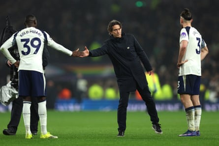 Thomas Frank shakes hands with Randal Kolo Muani after Spurs’ home defeat against Newcastle