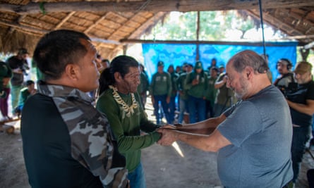 Possuelo is welcomed to the Guajajara community by leaders including Olímpio Iwyramu Guajajara