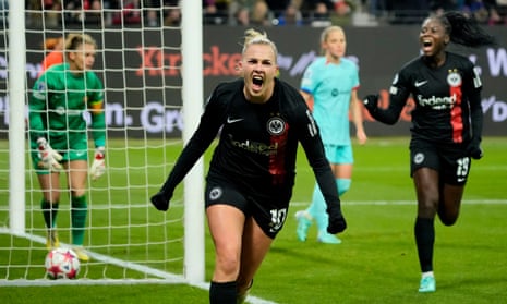 Frankfurt's Laura Freigang celebrates after opening the scoring against Barcelona.