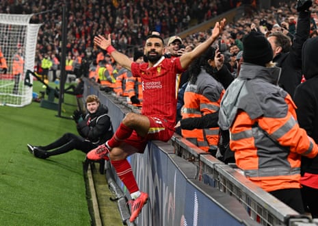 Mohamed Salah of Liverpool celebrates after scoring the second goal against Aston Villa at Anfield