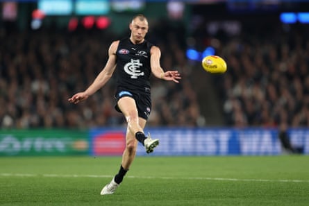 Will Hayward kicks a ball