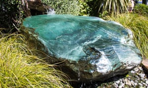 A massive pounamu weighing 1.8 tonnes at Rainbow Springs in Rotorua is worth approximately $1m.