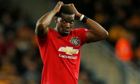 Manchester United’s Paul Pogba reacts after his penalty is saved at Wolves.