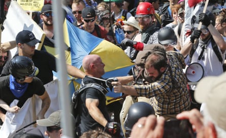 White nationalist demonstrators clash with counterprotesters on 12 August 2017 in Charlottesville.